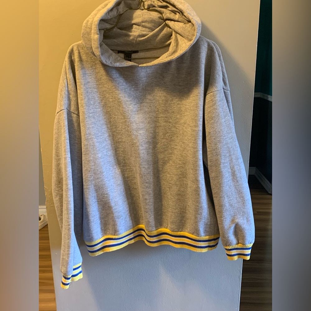 Hoodie from Forever 21, grey , yellow , and blue, size L.
